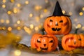 Three spooky orange pumpkins. Free space for a text. Closeup