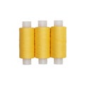 Three spools of yellow thread