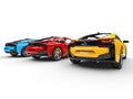 Three sports cars - primary colors - back view
