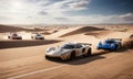 Three sports cars speed across desert landscape on dirt road Royalty Free Stock Photo