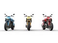 Three sports motorcycles in a row - front view Royalty Free Stock Photo