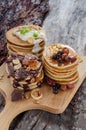 Three stack of pancakes with chocolate, yogurt and caramel syrup. Royalty Free Stock Photo