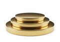 Three stacked circular metallic objects with a polished golden sheen against a white backdrop Royalty Free Stock Photo