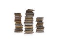 Three stacks of coins isolated on white Royalty Free Stock Photo