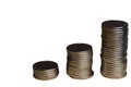 Three stacks of iron coins stand in a row on a white clipping background. Left empty space for an inscription Royalty Free Stock Photo