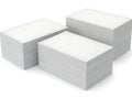 Three stacks of pristine white paper sheets Royalty Free Stock Photo