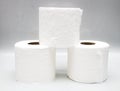 Three stacks of toilet paper