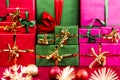 Three Stacks of Xmas Presents Arranged by Color Royalty Free Stock Photo