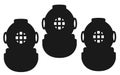 Three standard diving dress hard hat or copper hat equipment set against a white backdrop Royalty Free Stock Photo