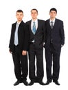 Three standing young businessmen