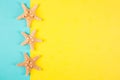 Three starfishes on colored mint and yellow backgrounds with neg