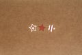 three stars on brown craft paper background Royalty Free Stock Photo