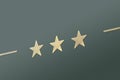 Three stars on green