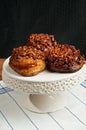 Three sticky buns with pecans Royalty Free Stock Photo