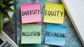 Three Sticky Notes Core Values of Diversity Equity Inclusion Belonging