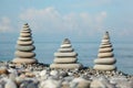 Three stone stacks on pebble beach