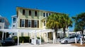 Three-story houses with white pergola and picket fence curb appeal along scenic 30A country road in Santa Rosa, South Walton, Royalty Free Stock Photo