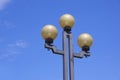 Three street lamps made of black metal. Royalty Free Stock Photo