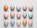 three strings of decorated eggs on a light background. Easter concept