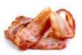 Three strips of fried crispy bacon. Royalty Free Stock Photo