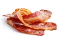 Three strips of fried crispy bacon. Royalty Free Stock Photo