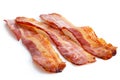 Three strips of fried crispy bacon. Royalty Free Stock Photo