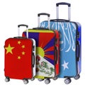 Three suitcases with the image of the flags