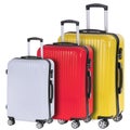 Three suitcases red, white and yellow