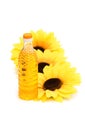 Three sunflowers and bottle