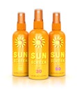 Three sunscreen spray bottles