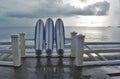 Three 3 surf boards fronting the sea Royalty Free Stock Photo