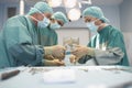 Three Surgeons At Work In Operating Theatre Royalty Free Stock Photo