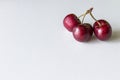 Three sweet cherries on a white background Royalty Free Stock Photo