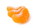 Three sweet juicy mandarin slices Isolated on white background. Royalty Free Stock Photo