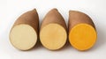Three sweet potatoes showing different colored cross-sections. Royalty Free Stock Photo
