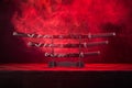 Three swords on stand, red smoke behind