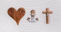 The three symbols of the devine trinity: heart, anchor, cross. Royalty Free Stock Photo