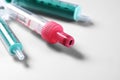 Three Syringes without needles over grey background Royalty Free Stock Photo