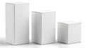 Three tall white rectangular boxes in varying heights. Royalty Free Stock Photo