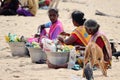 Three tamil women selling fruit salad at sightseeing in India talking about trade after the corona epidemic