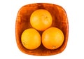 Three tangerine in bamboo bowl on white