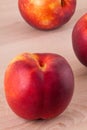 Three tasty fresh ripe juicy nectarines Royalty Free Stock Photo