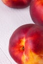 Three tasty fresh ripe juicy nectarines Royalty Free Stock Photo