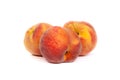 Three tasty juicy peaches on a white background Royalty Free Stock Photo