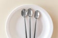 Three teaspoons are on the plate Royalty Free Stock Photo
