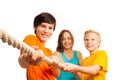 Three teen friends pulling the rope Royalty Free Stock Photo