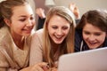 Three Teenage Girls Using Laptop In Bedroom Royalty Free Stock Photo