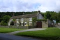 Three terraced, stone built, slate roofed cottages, Ryedale, UK