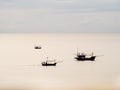 Three thai fisherman boat in the sea Royalty Free Stock Photo