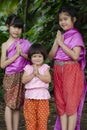 Three thai Girls pose welcome Sawasdee